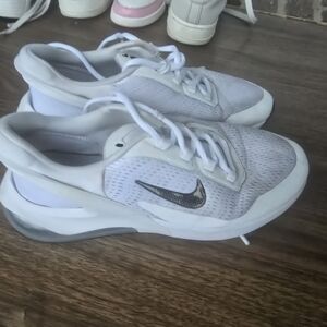 White Nike Sneakers with Black Swoosh